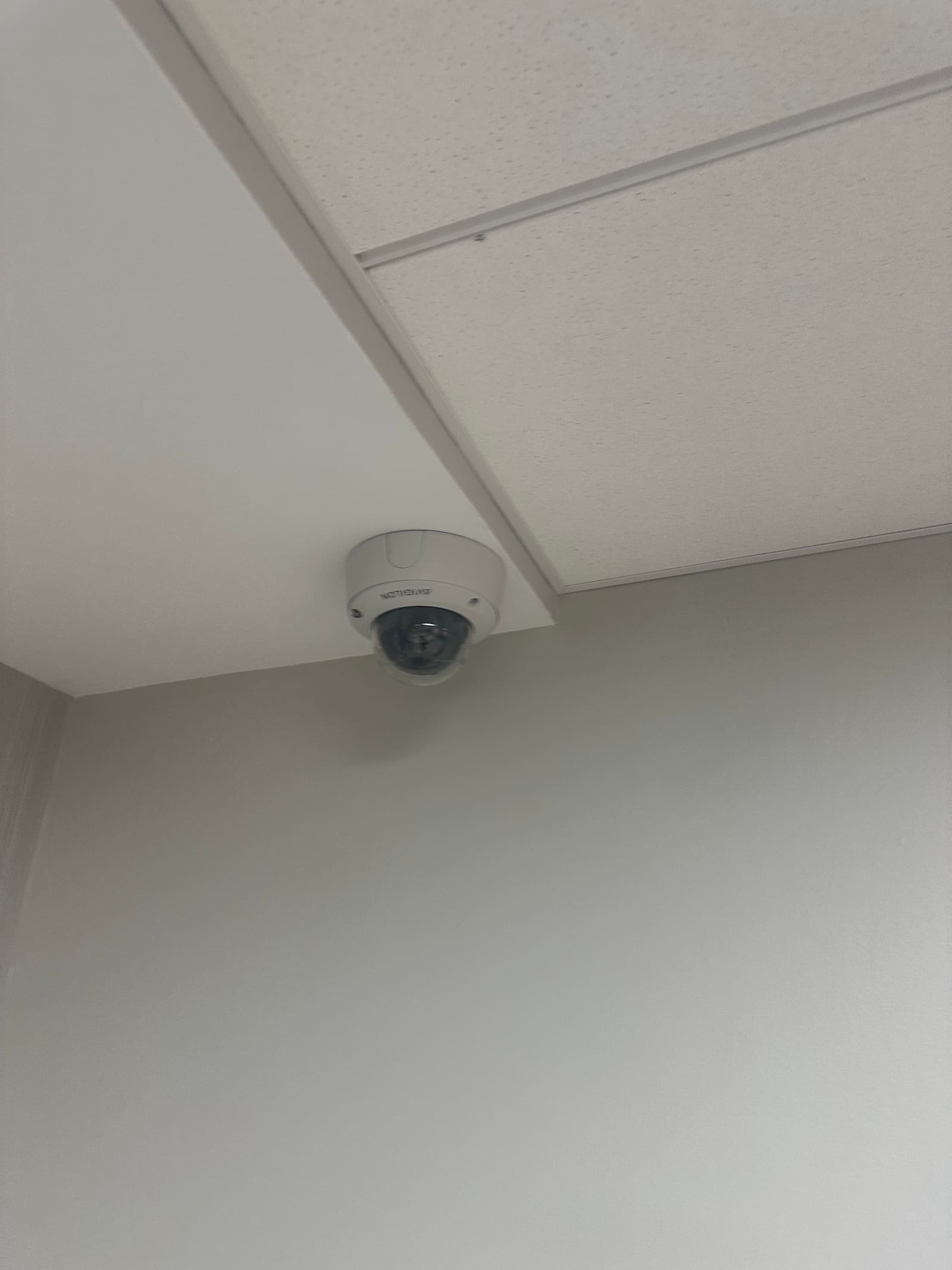 Interior dome camera on an office ceiling
